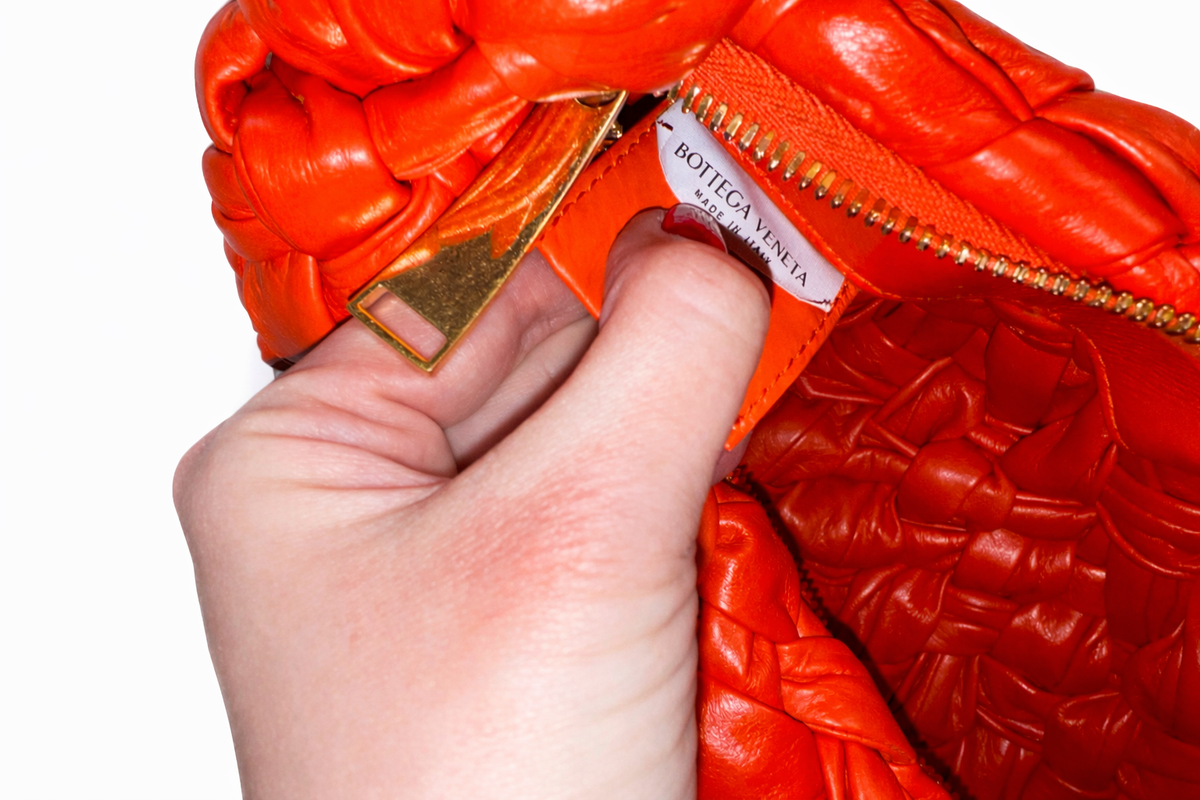 Bottega Veneta Leather Intrecciato Banana Shoulder Bag Orange ladies