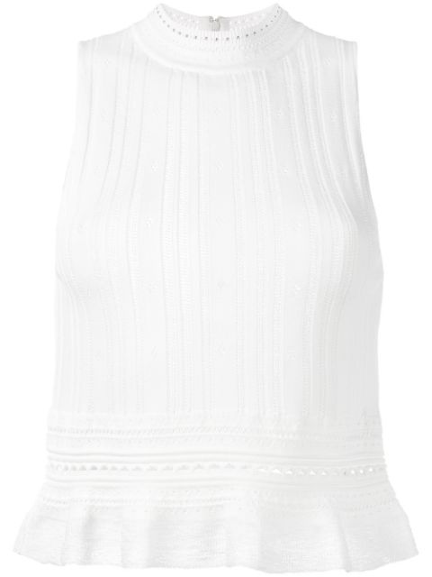 white sleeveless peplum top