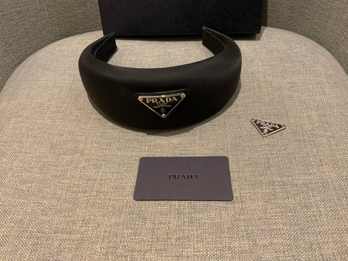 Prada headband with signature triangle and logo at top ladies