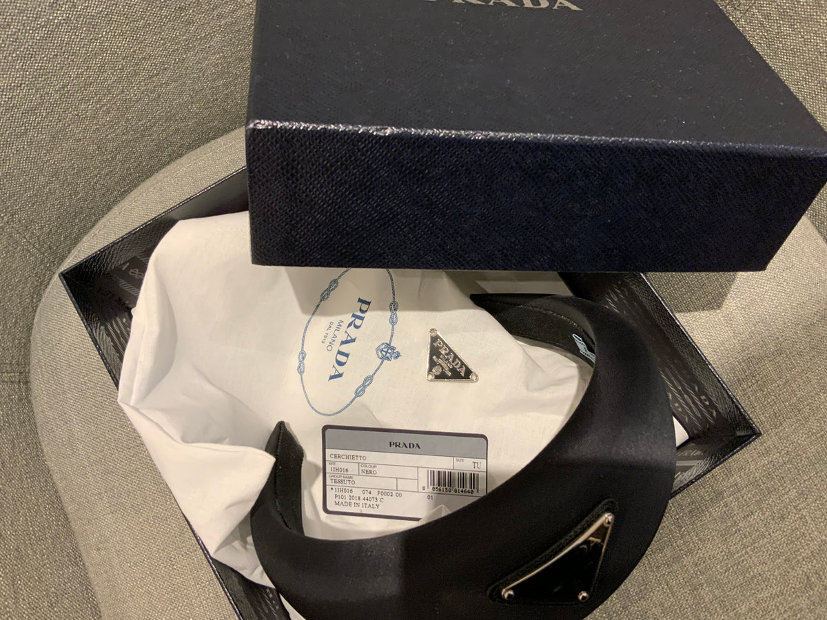 Prada headband with signature triangle and logo at top ladies
