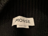 MONSE  Upside Down Oversized Cutout Merino Wool Turtleneck Sweater In Black XS ladies