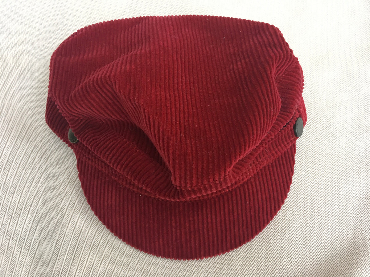 Burberry London Newsboy cap in a burnt red corduroy gunmetal hardware M Ladies