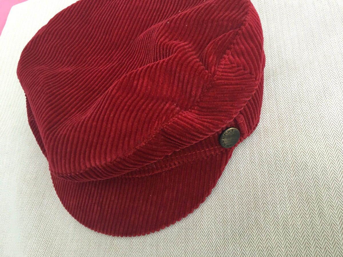 Burberry London Newsboy cap in a burnt red corduroy gunmetal hardware M Ladies