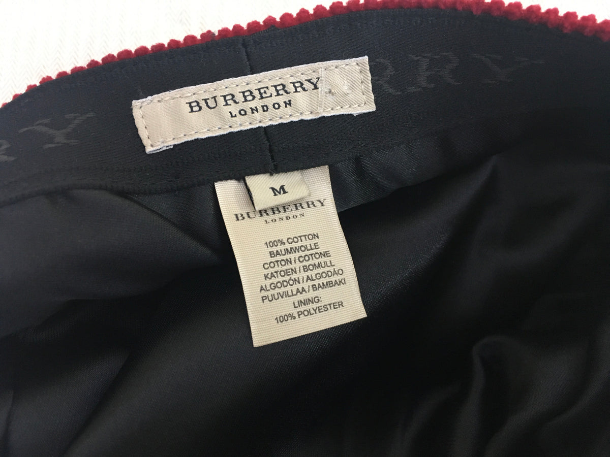 Burberry London Newsboy cap in a burnt red corduroy gunmetal hardware M Ladies