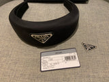Prada headband with signature triangle and logo at top ladies