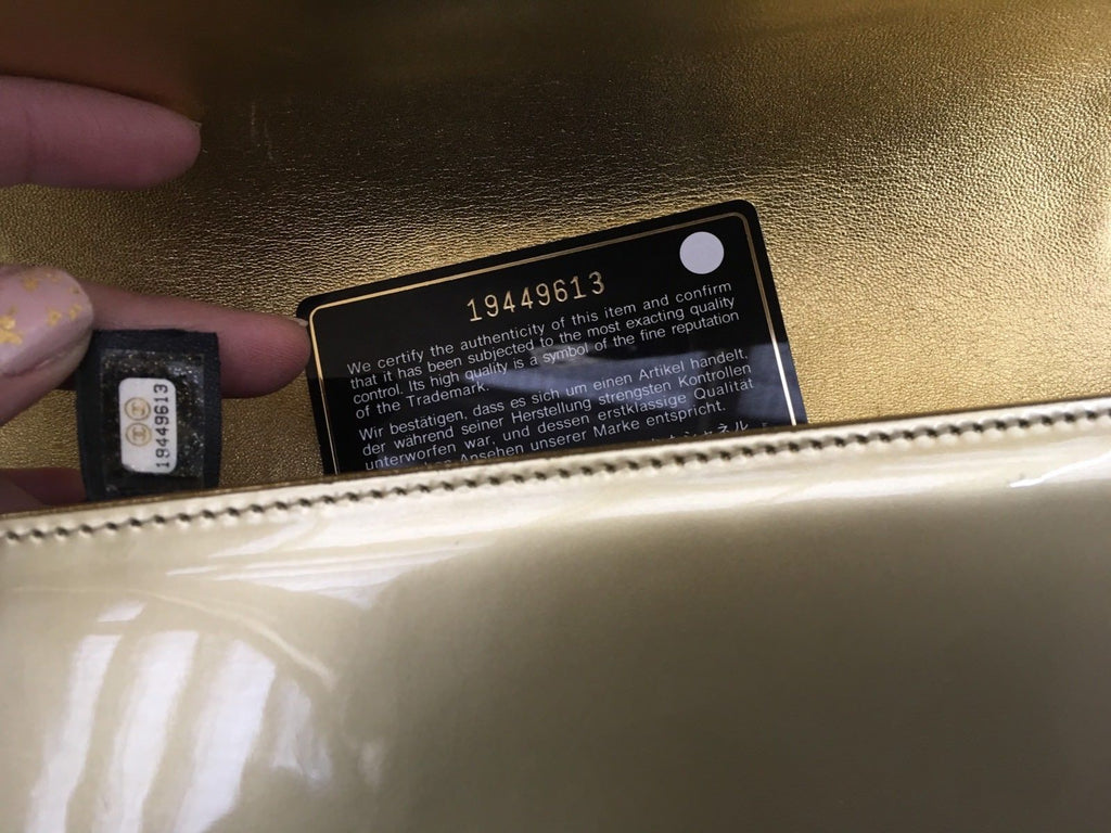 Chanel Limited Edition Metallic Gold Patent Medium Boy Flap Black Bag –  Afashionistastore